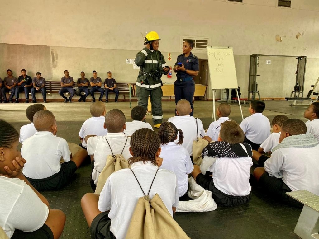 Learners working with a teacher